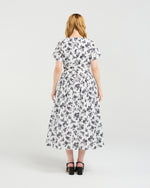 Woman wearing a floral dress on a white background
Scarlett Dress Floraline