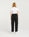 Person wearing a white t-shirt and black pants on a plain background
Lilith Pants Black