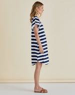 Woman wearing a blue and white striped dress against a beige background
Sydney Tee Dress Blue Stripe