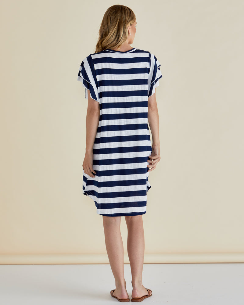 Woman wearing a blue and white striped dress against a beige background
Sydney Tee Dress Blue Stripe