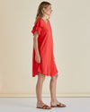 Woman wearing a red dress with ruffled sleeves against a beige background
Sydney Tee Dress Red
