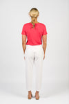Person wearing a red shirt and white pants on a white background
Skinny Leg 7/8 Pants White
